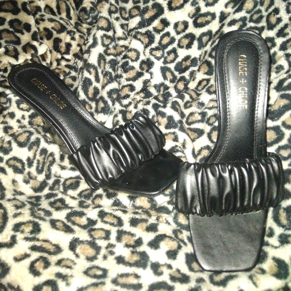 Clear wedge block w/ black strap across top of toes!! WORN ONCE!!